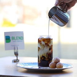 Pouring cold brew creamer