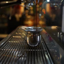 Espresso machine in action